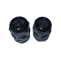 Two black multi-hole cable glands, M25x1.5