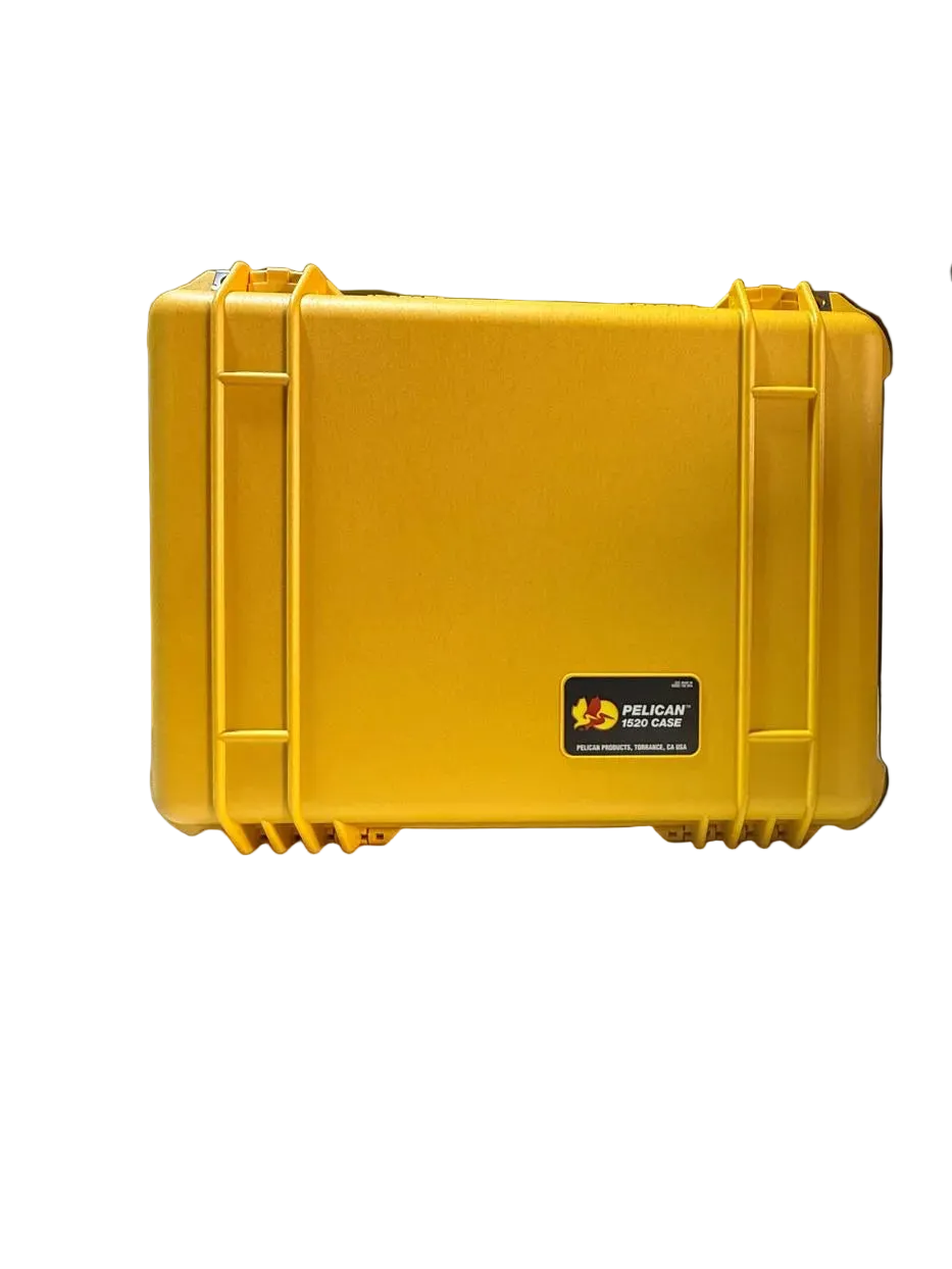 Yellow hard-shell case with Pelican logo on a wooden floor.